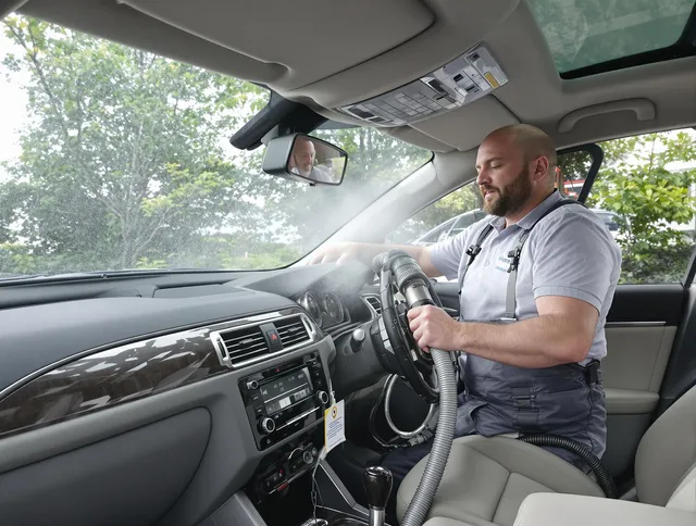 Raynham Air Duct Cleaning specialist performing professional car duct cleaning in Raynham